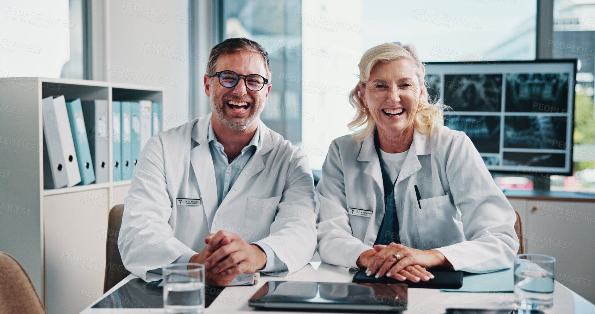 Buy stock photo Portrait, happy and doctors laughing at hospital with x ray study, laboratory results and collaboration. Mature, smile and online info for radiology, problem solving and medical report for scan