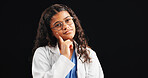 Thinking, child and doctor with glasses in studio for future career, playful learning and medical ideas. Kid, thoughts and eyewear of healthcare fantasy, treatment and opportunity on black background