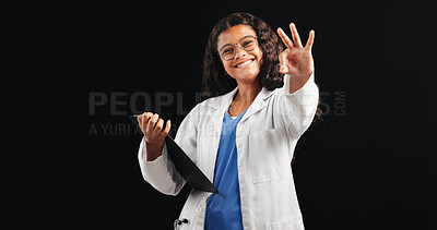 Buy stock photo Portrait, child and doctor with okay sign for future career, medical job and treatment agreement. Studio, kid and clipboard with healthcare fantasy, diagnosis results and referral on black background