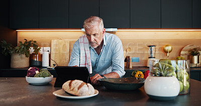 Buy stock photo Mature man, tablet and search with recipe tutorial, dinner method or online guide in home. Learning, instructions and senior person in kitchen with healthy ingredients, diet or steps in meal prep