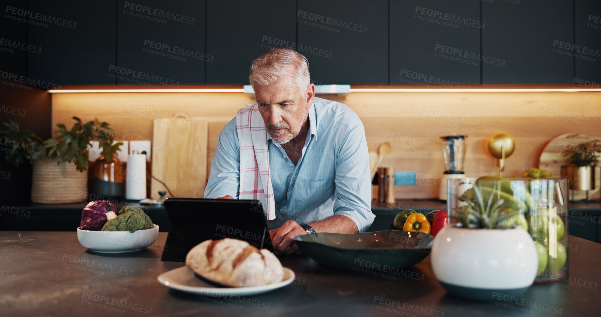 Buy stock photo Mature man, tablet and search with recipe tutorial, dinner method or online guide in home. Learning, instructions and senior person in kitchen with healthy ingredients, diet or steps in meal prep