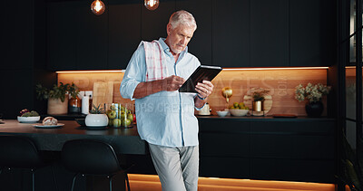 Buy stock photo Mature man, tablet and online search for recipe tutorial, dinner method or guide in home. Learning, instructions and senior person in kitchen with reading, diet planning or steps in meal prep