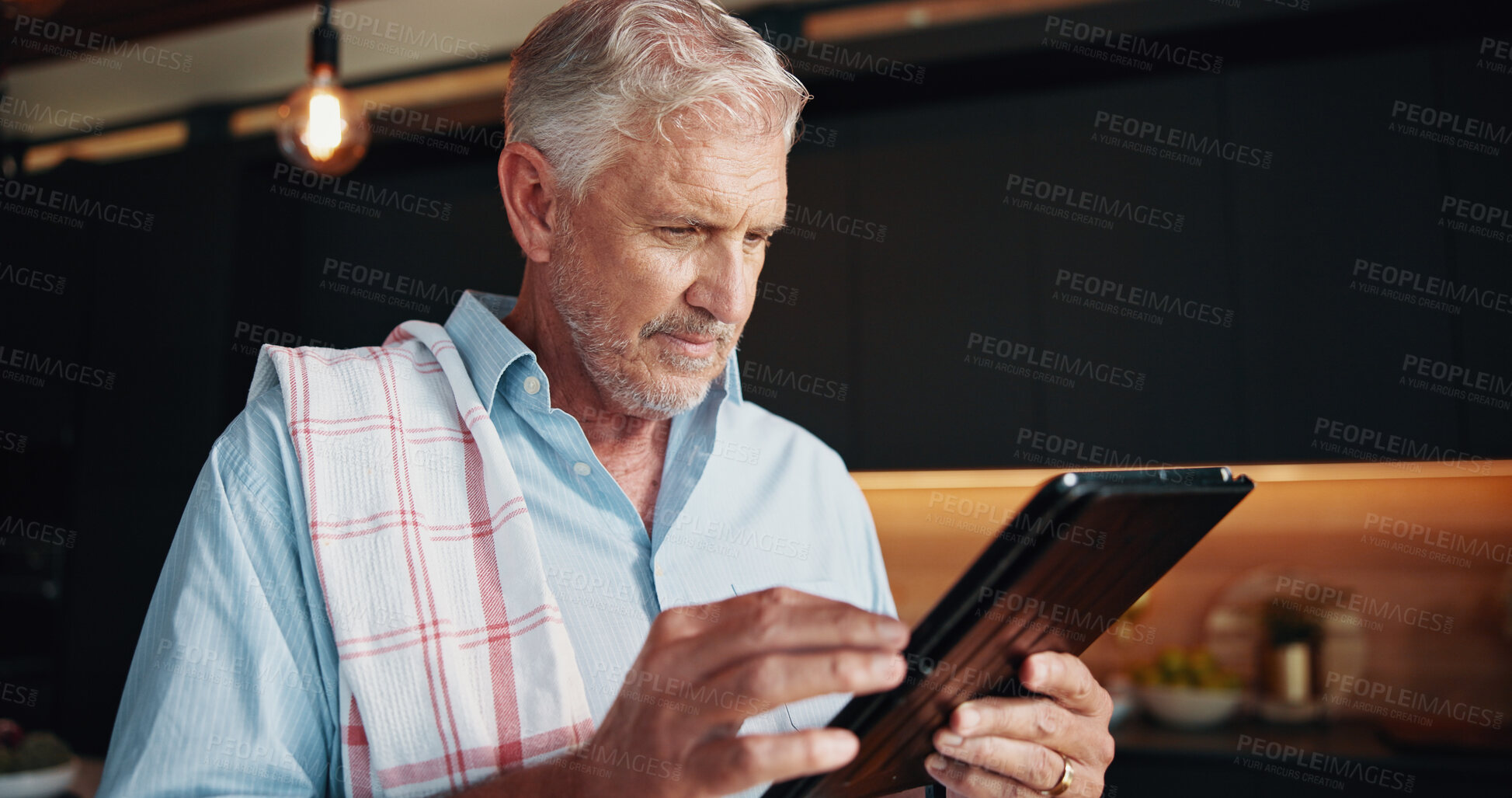 Buy stock photo Senior man, tablet and thinking with recipe blog, dinner tutorial or online guide in home. Learning, instructions and mature person in kitchen with healthy ingredients, diet or steps in meal prep