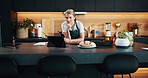 Home, thinking and woman in kitchen, tablet or food with nutrition, social media or chef. Senior person, apartment or chef with tech, influencer or problem solving with research for baking technique 