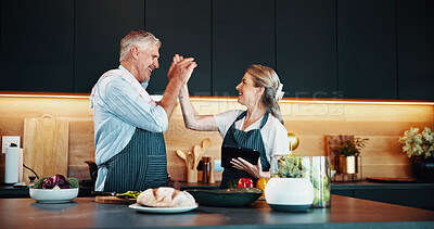 Buy stock photo Home, couple and high five for meal, cooking and bonding with ingredients for cuisine in kitchen. Healthy food, dinner and mature people with tablet for recipe, happy and celebration for success