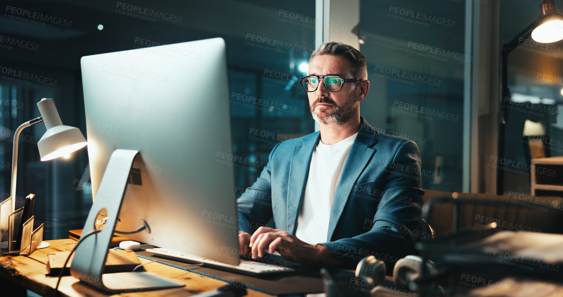 Buy stock photo Business, man and computer in office at night for programming server, software update of deadline. Mature programmer, online and it research for problem solving, system error and solution for upgrade