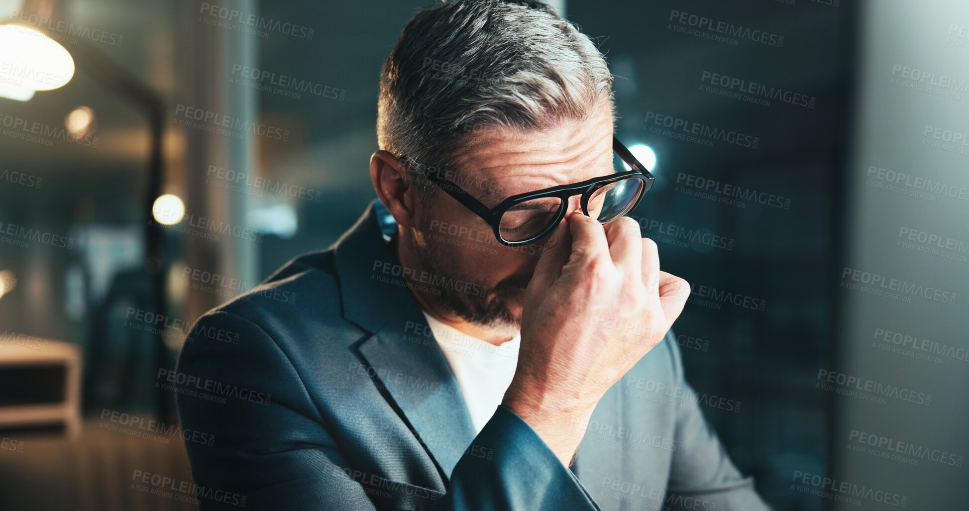Buy stock photo Night, business and man in office, headache and overworked with stress, depression and tired. Evening, person and employee with glasses, migraine and frustrated with fatigue, exhausted and pain