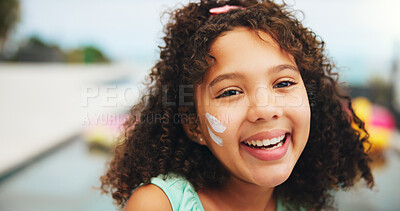 Buy stock photo Outdoor, portrait and child with sunscreen for skincare, sunburn prevention and wellness on holiday. Poolside, female person and happy girl with spf cream for cosmetics, UV protection and vacation