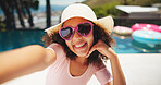 Portrait, child and sunglasses with smile for selfie, vacation holiday and picture for memories outdoor. Poolside, happy girl and hat with shades for fashion, photography or positive vibes for travel