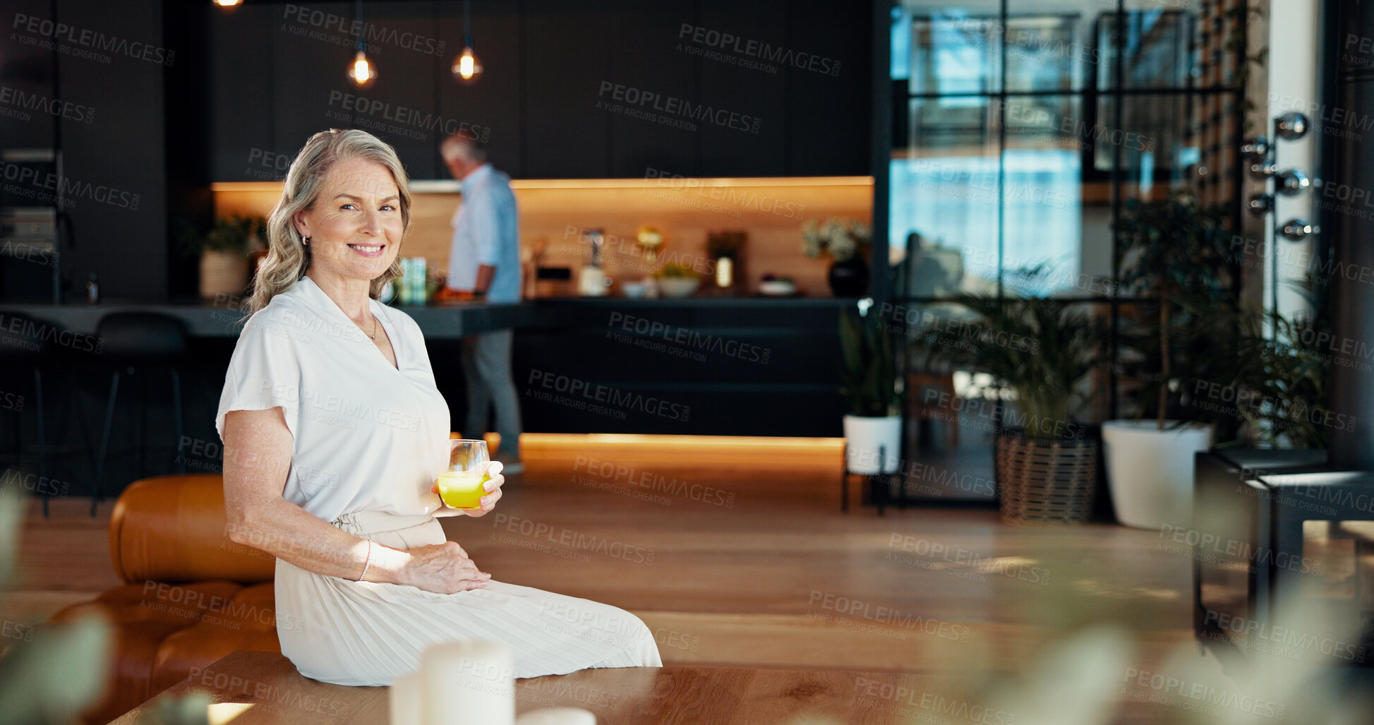 Buy stock photo Portrait, mature or happy woman with cocktail in home for wellness, citrus flavour or break on weekend. Relax, energy and healthy person drinking fruit beverage for nutrition or vitamins in house