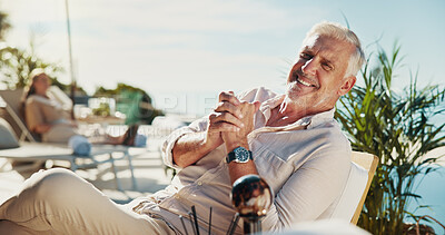 Buy stock photo Portrait, outdoor and man with resort, vacation and relax with weekend break, smile and hands together. Mature person, summer holiday and happy guy with comfort, adventure and traveling in Zanzibar