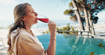 Buy stock photo Relax, vacation and woman with wine, drinking or break for mature person with alcohol or travel. Outdoor, paradise and tourist with liquor for holiday, hotel and comfortable on getaway, trip and calm