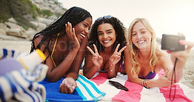 Buy stock photo Camera, selfie or friends at beach with smile, photoshoot or reunion for photography on holiday. Peace sign, ocean and happy people bonding together on break for picture, fun memory and diversity
