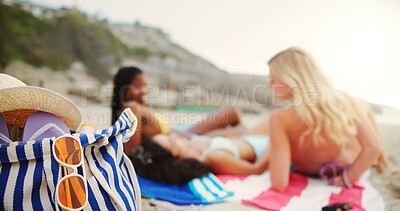 Buy stock photo Bag, women and relax with beach for vacation, summer holiday or day ocean coast in nature. Back, female people or friends lying with equipment for getaway, sunshine or picnic on sandy shore at sea