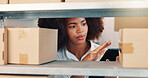 Tablet, distribution and box with woman in warehouse for storage, logistics schedule and inventory. Planning, ecommerce and supplier checklist with african employee in factory for cargo procurement