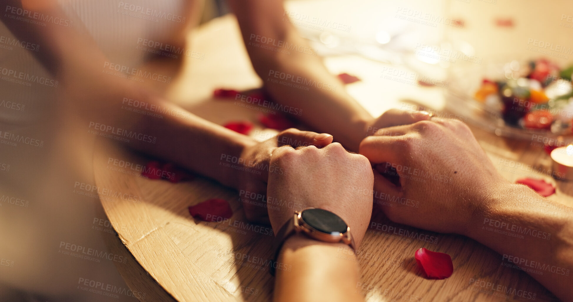 Buy stock photo Couple, holding hands and love on date at restaurant for valentines day, romantic dinner and celebration. People, closeup and affection of fine dining, anniversary bonding and relationship commitment