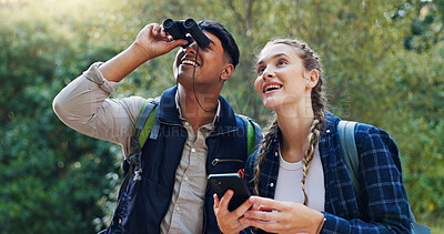 Buy stock photo Hiking, bird watching and couple with smartphone, binoculars and break with hobby, smile and network. People, outdoor and man with woman, adventure and cellphone with journey, traveling and friends