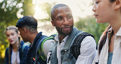 Buy stock photo Hiking, nature and people with discussion, travel and relax with weekend break, hobby and adventure. Healthy, outdoor and friends with conversation, calm and fitness with smile and group in forest