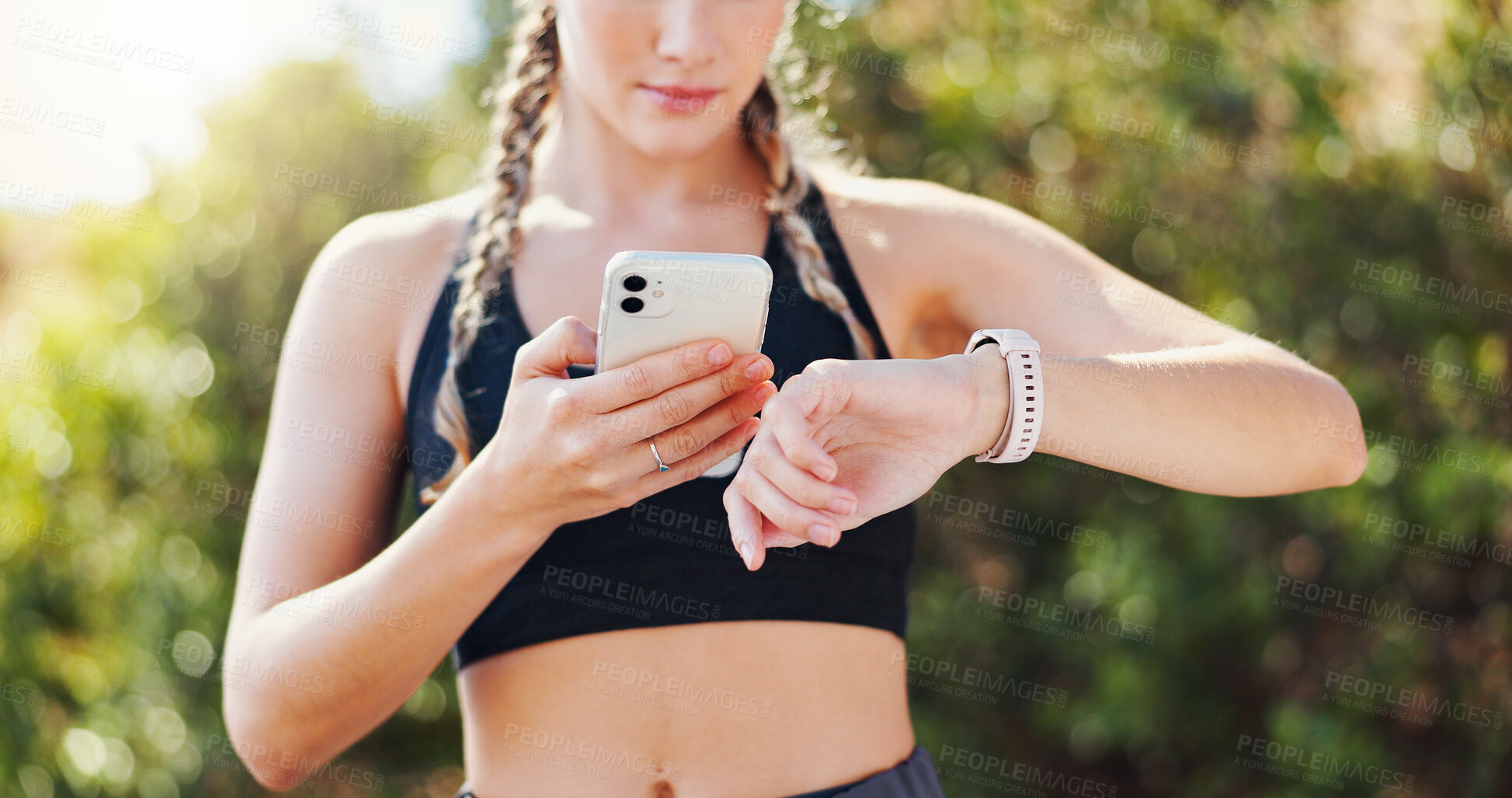 Buy stock photo Smart watch, fitness and woman with phone in park for exercise, training and workout outdoors. Sports, runner and person check time or tracking heart rate for health, wellness app and performance