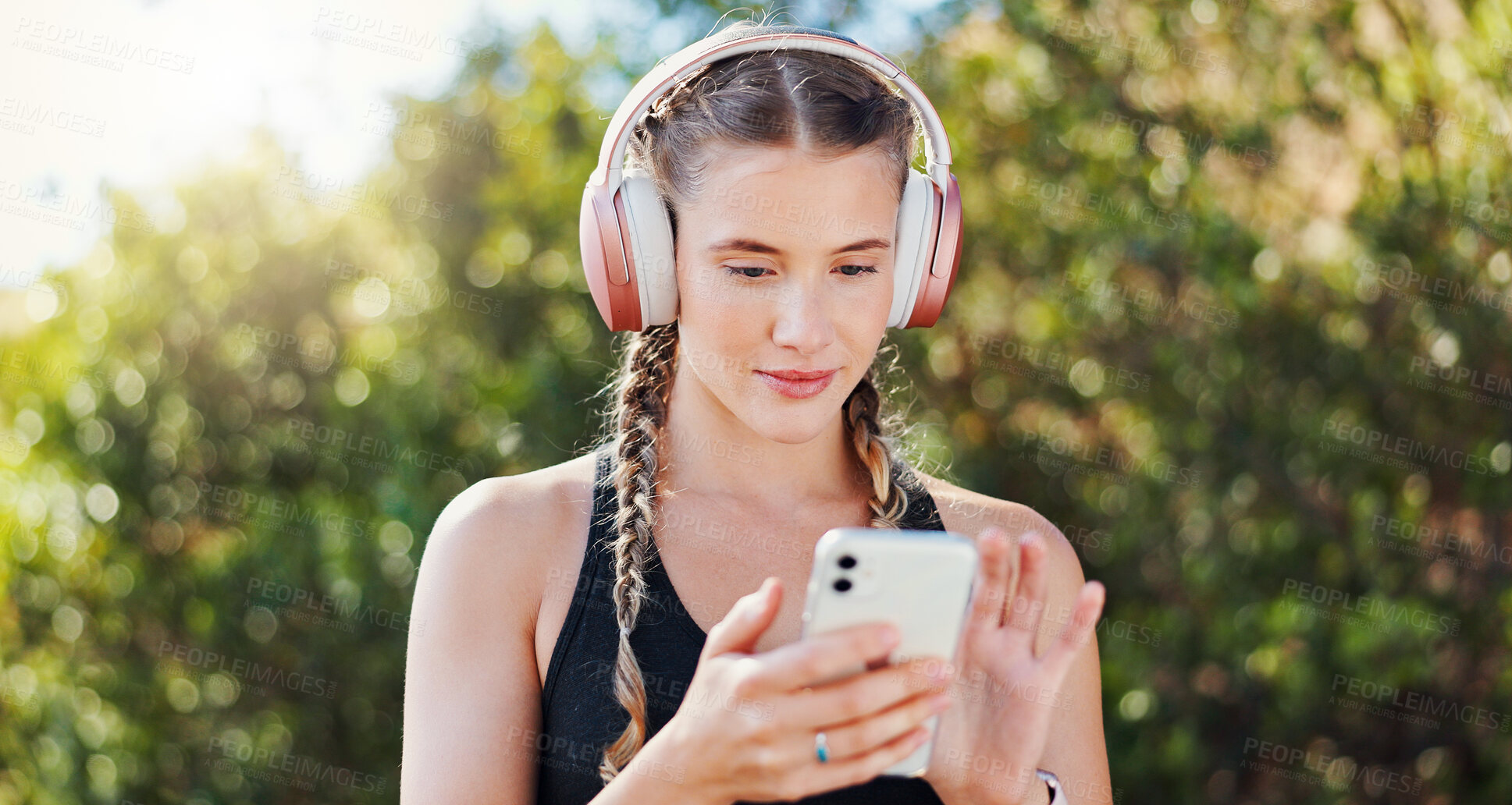 Buy stock photo Girl, headphones and phone of outdoor fitness for listening to music, streaming audio or track progress. Active, woman and runner on mobile of exercise podcast, training website and marathon practice