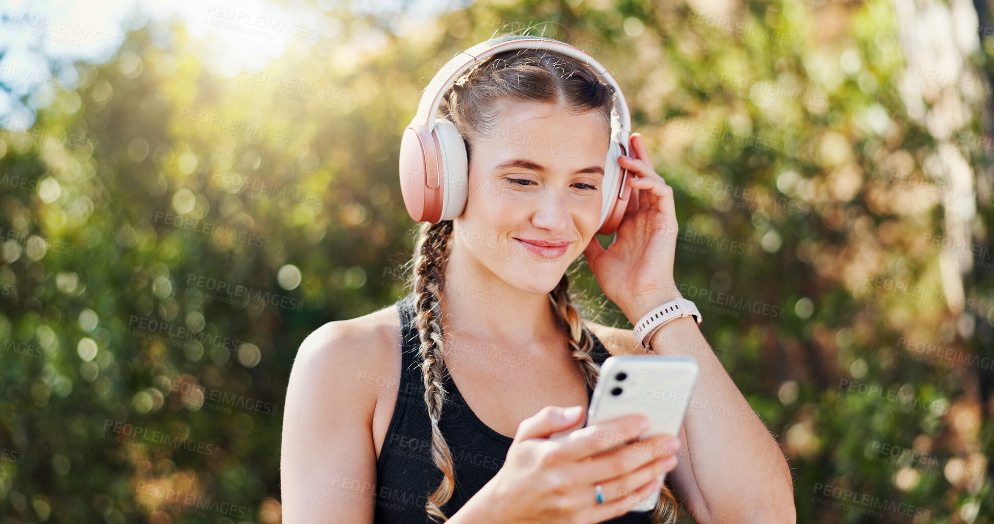 Buy stock photo Smile, woman and headphones with phone of fitness for listening to music, streaming audio and playlist. Below, female runner and mobile app of exercise podcast, training website and marathon practice