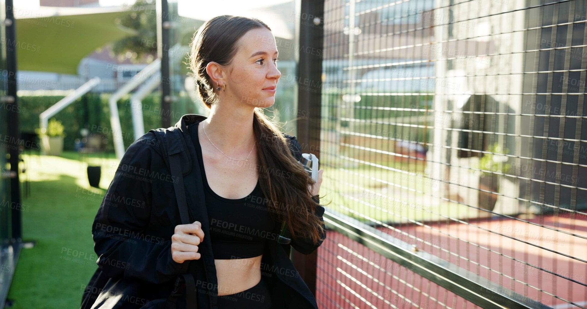 Buy stock photo Tennis, walking and woman with bag on court ready to start training, match and game outdoors. Sports club, athlete and person for exercise, workout and fitness for practice, playing and competition