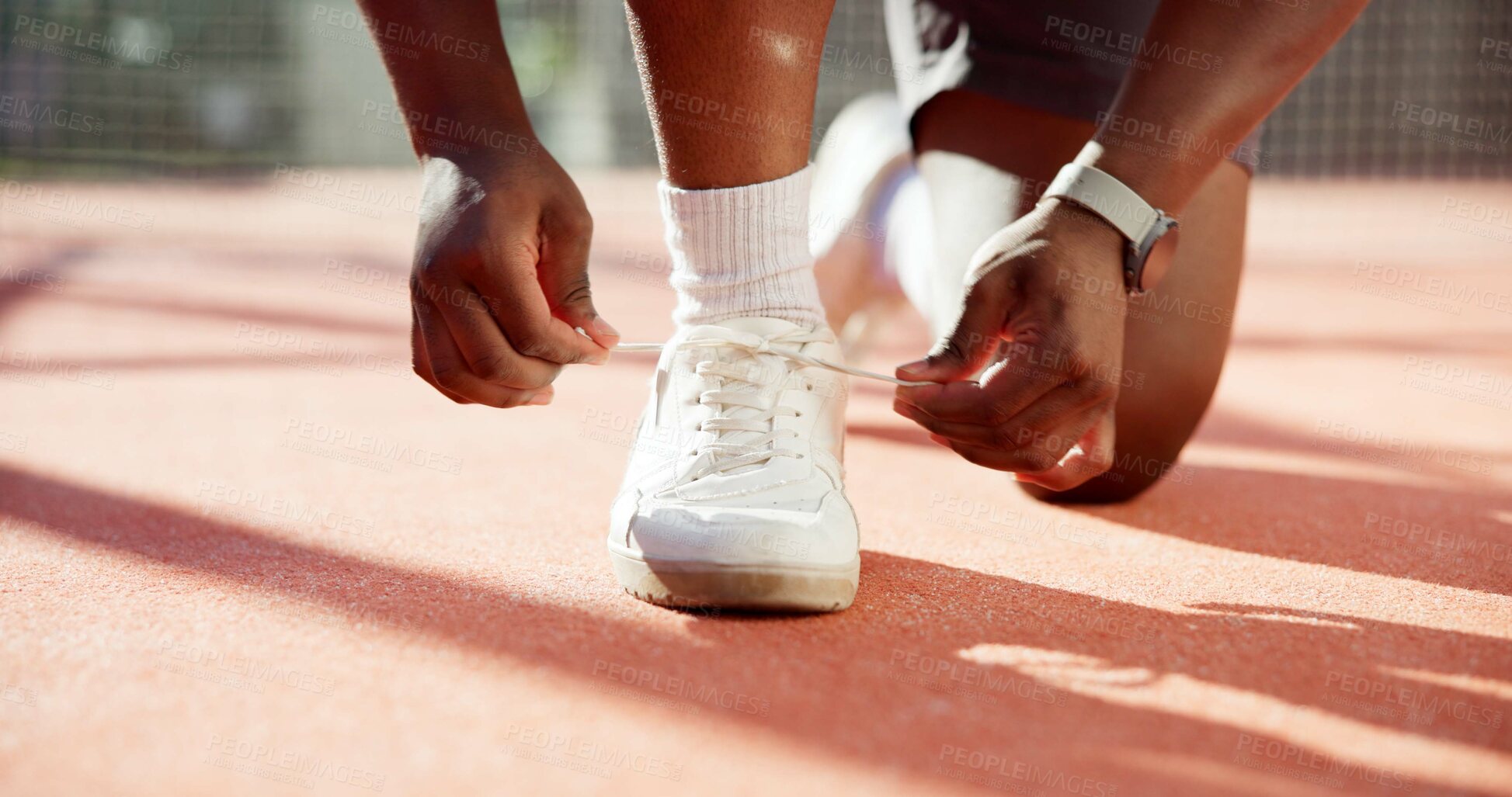 Buy stock photo Person, hands and tying shoes with laces for sport, fitness or outdoor exercise on turf or court. Closeup, athlete or runner getting ready with tie or sneakers for game, match start or workout prep