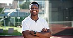 Happy, black man or portrait with confidence for tennis, sport or competitive match. Face, African athlere or player with smile or arms crossed for fitness, game or padel competition on court or turf