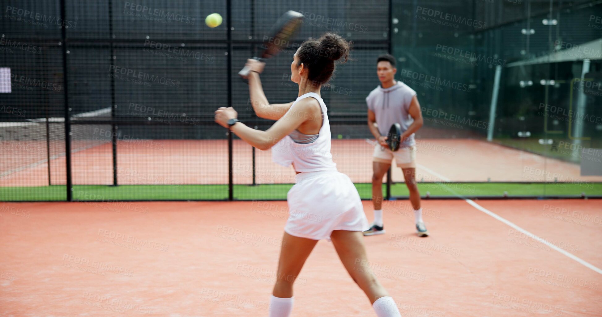 Buy stock photo Athlete, girl and playing padel on court with serving ball, team competition and tournament match. Tennis player, fitness and ready with racket for club practice, sports training and game performance