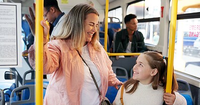 Buy stock photo Happy, mother and child with travel on bus for morning commute, school destination and protection. Woman, girl kid and smile on public transportation for journey together, safety and bonding on trip
