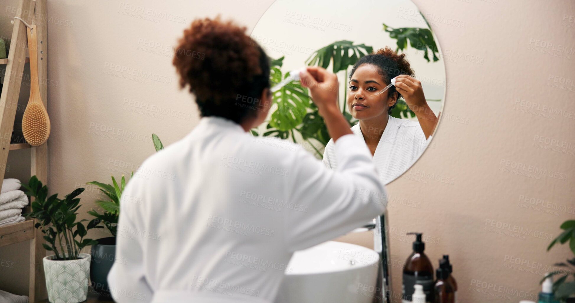 Buy stock photo Woman, skincare and mirror with dropper in bathroom for beauty, cosmetics or oil at home. Female person, reflection or dermatology with hygiene for facial, liquid collagen or spa treatment at house