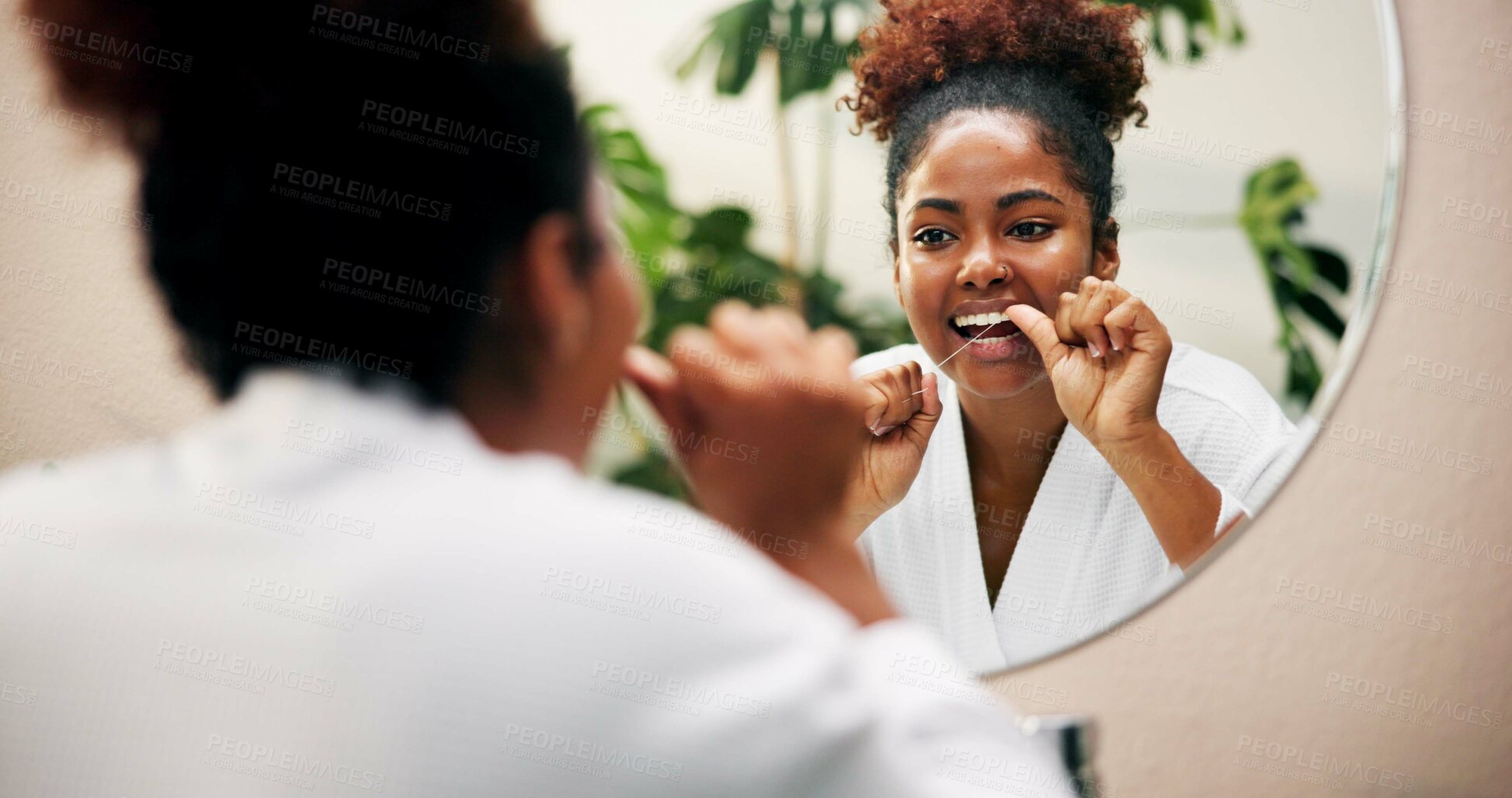 Buy stock photo House, mirror and black woman in bathroom, floss and dental hygiene for fresh breath. Apartment, reflection and person with string, oral health and remove plaque with wellness and teeth whitening