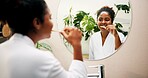 Oral hygiene, mirror and girl brushing teeth in home for morning routine, fresh breath or plaque removal. Reflection, person or getting ready in bathroom with dental care, mouth health or gum disease