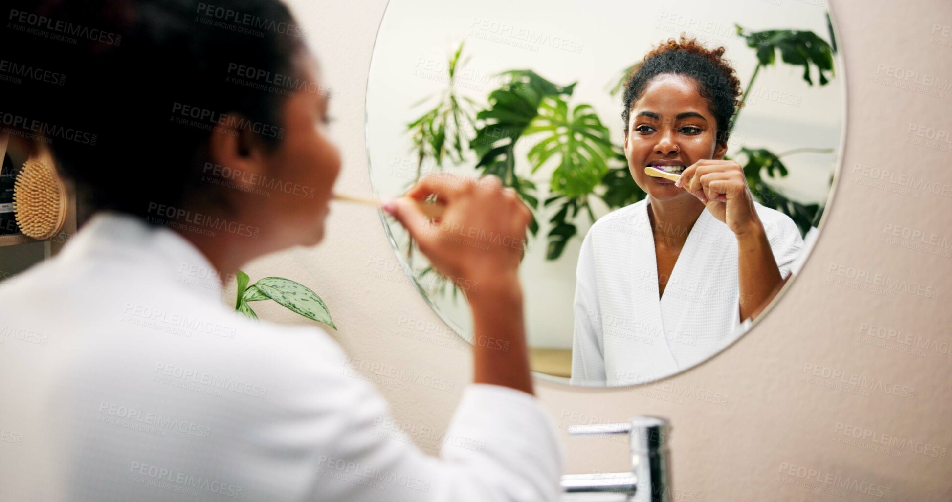 Buy stock photo Oral hygiene, mirror and girl brushing teeth in home for morning routine, fresh breath or plaque removal. Reflection, person or getting ready in bathroom with dental care, mouth health or gum disease