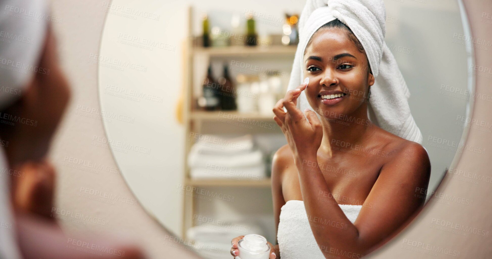 Buy stock photo Mirror, cream and woman in bathroom, dermatology and home with cosmetics, shine and wellness. Skincare, happy person and girl with healthy skin, morning and reflection with lotion, glow and smile