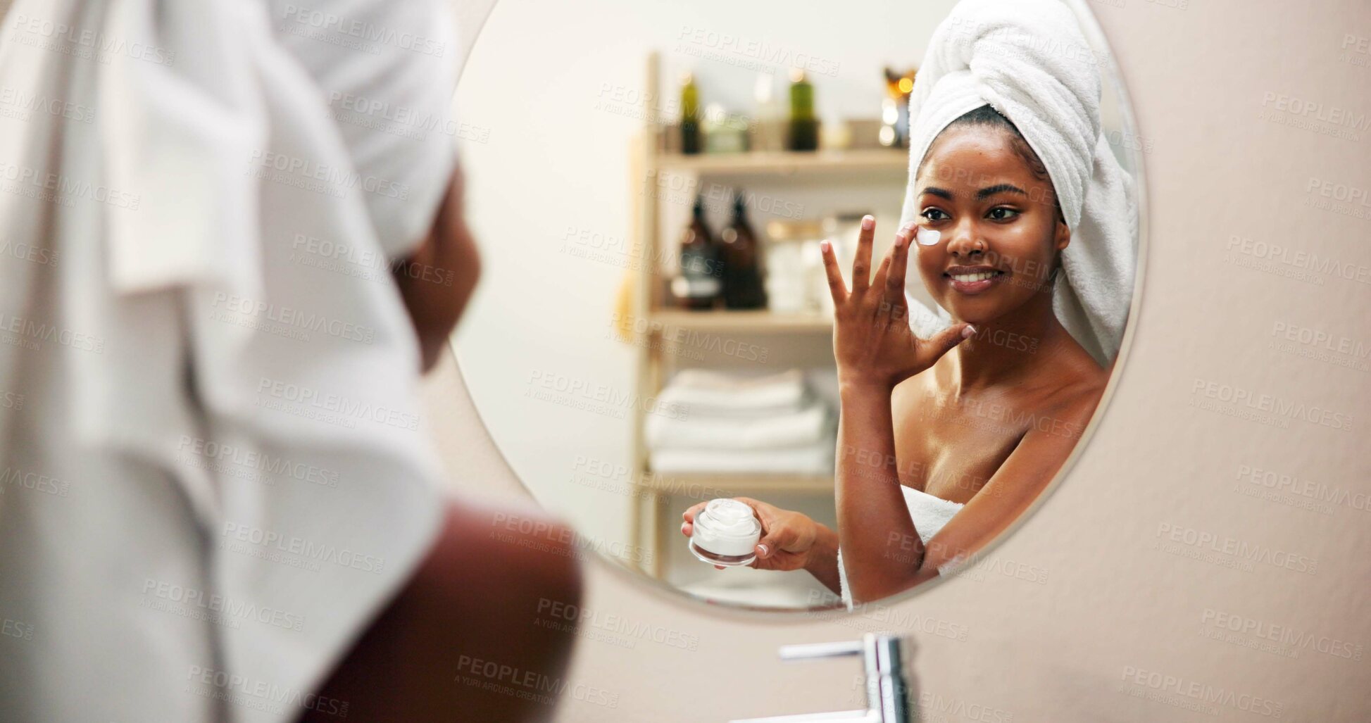 Buy stock photo Mirror, cream and woman in bathroom, cosmetics and home with grooming, glow and wellness. Dermatology, happy person and girl with healthy skin, morning and reflection with lotion, shine and skincare