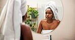 Bathroom, mirror and black woman with towel for skincare, health and wellness for morning routine. Home, washing face and person with reflection for facial treatment, beauty and cosmetics for cleanse