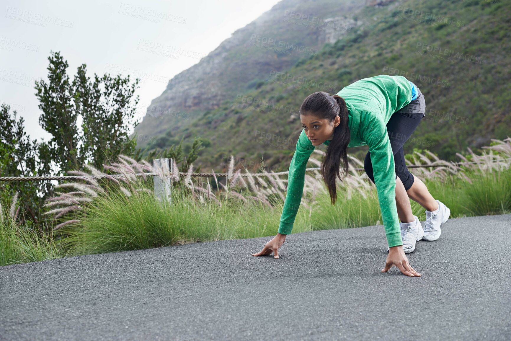Buy stock photo Woman, on her mark and start running for fitness, race or marathon with athlete training outdoor. Runner is ready for exercise, cardio and speed with challenge, sports for health and wellness