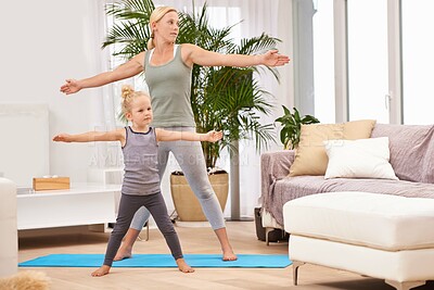 Buy stock photo Yoga, exercise with mother and daughter in living room, stretching out arms for balance and bonding. Woman, young girl and fitness together at family home, health and wellness with love and care