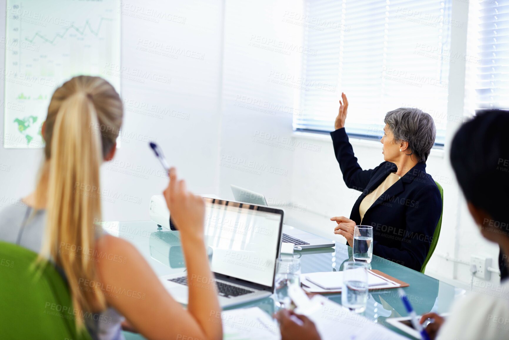 Buy stock photo Women, meeting and boardroom with laptop for  presentation with graph, statistics and feedback on company growth. Office, female person and back view of client with paperwork, question and briefing. 