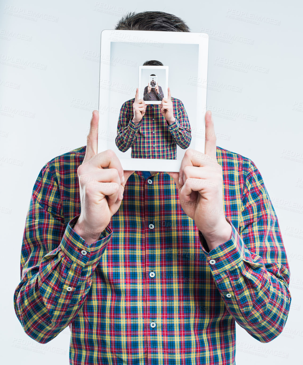 Buy stock photo Man, tablet and recursive screen in studio for futuristic illusion, droste effect and infinity on white background. Digital technology, frame and cover face for surreal photography, repeat or selfie