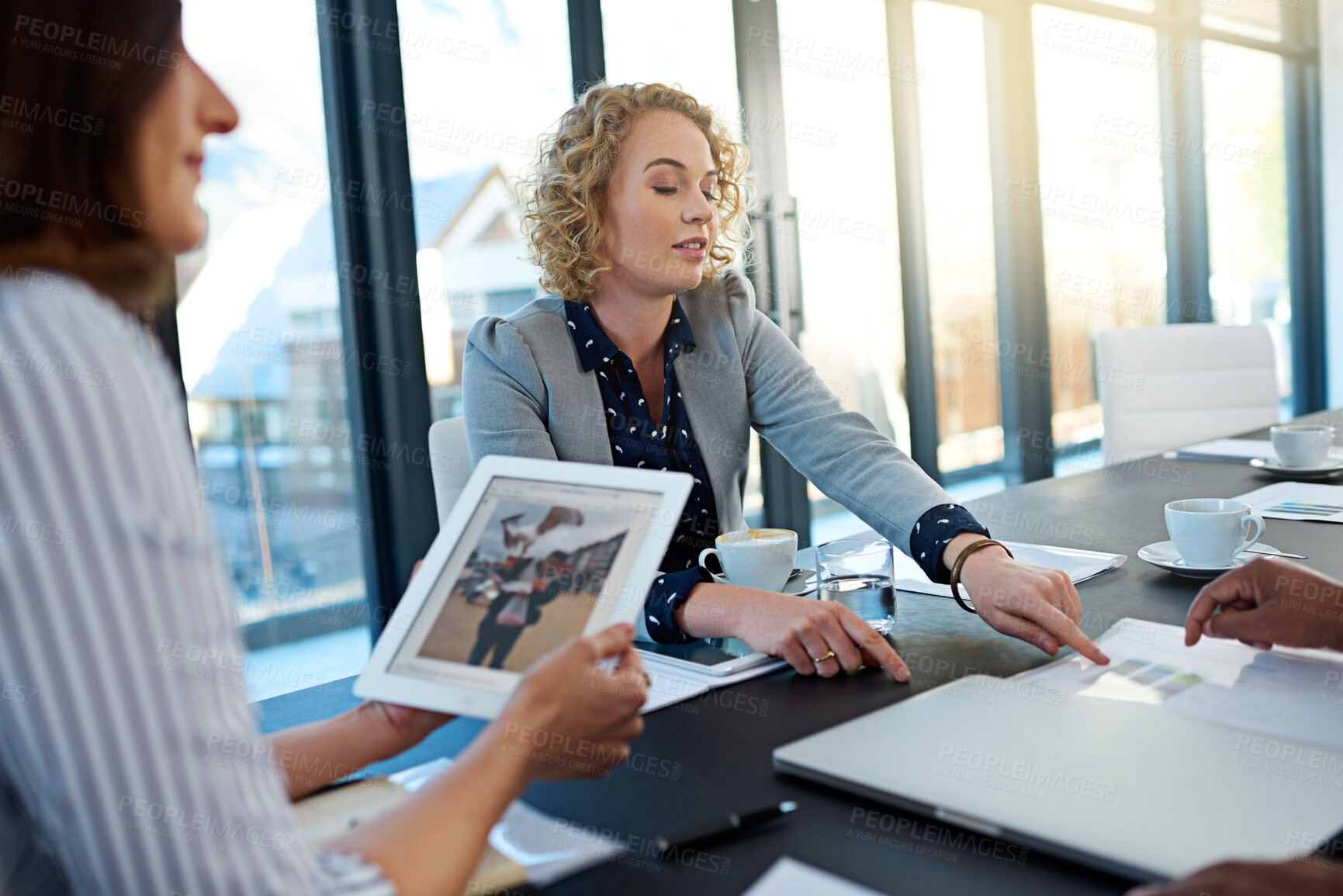 Buy stock photo Business people, boardroom and tablet for talk on design, teamwork and problem solving. Employees, speaking and office for collaboration at creative training, research and meeting for online project