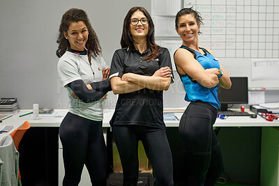 Buy stock photo Portrait, women and arms folded in workplace for fitness, teamwork and happiness in office at gym. Face, smile and female personal trainer for collaboration, exercise and athlete indoor for wellness