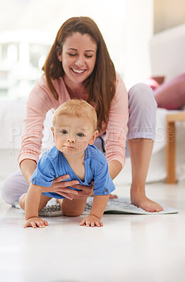 Buy stock photo Mom, toddler and happy with crawling for childcare to support, love and growth for child development. Parent, baby and smile in home with playing for bonding, childhood memories and fun with care