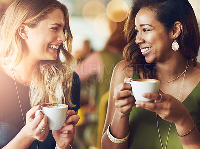 Buy stock photo Cropped shot of girlfriends enjoying their coffee at a cafe