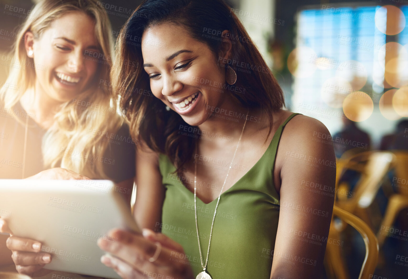 Buy stock photo Women, friends and coffee shop with tablet or laughing for funny meme, social media or restaurant. Female people, smile and technology in New York cafe with online humor or bonding, customer or relax