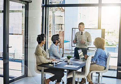 Buy stock photo Businessman, coaching and discussion with team in meeting, presentation or conference at office. Man or speaker talking to employees for company investment, revenue or financial growth at workplace