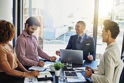 Buy stock photo Happy, business people and laptop with discussion in meeting for collaboration or friendly conversation at office. Group of employees smile for project, finance or strategy in conference at workplace