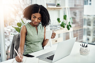 Buy stock photo Black woman, writing and office research at laptop as journalist with notebook, creative or project planning. Female person, smile and coffee up in startup agency for brief, review or brainstorming