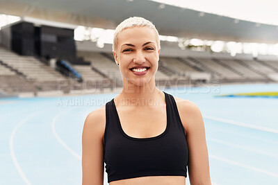 Buy stock photo Woman, portrait and athlete with smile on track field for health, wellness and running. Female runner, happy and workout with confidence for training, exercise and fitness with future athletic event